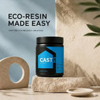 Container of CAST it eco-resin on a stone surface with a neutral background